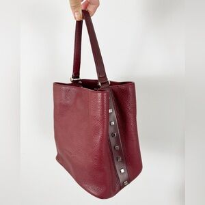 Puntotres leather bucket bag dark red studded made in spain handbag